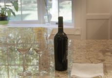 Wine bottle sitting on top of kitchen counter