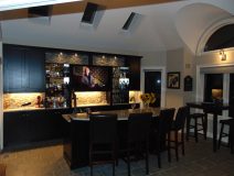 Renovated home bar with a tv