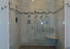 Shower with two hanging shower heads