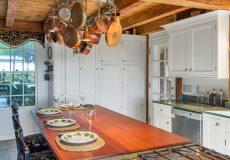 Remodeled kitchen with hanging pots