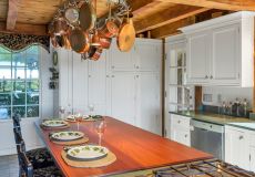 Remodeled kitchen with hanging pots